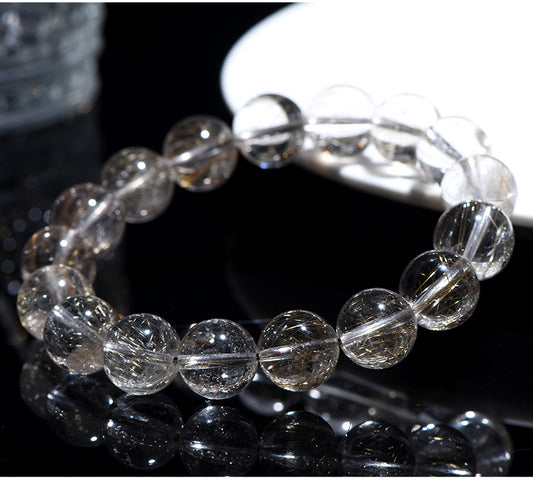 High-grade Silver Rutilated Quartz bracelet with clear polished beads and visible silver rutile inclusions.