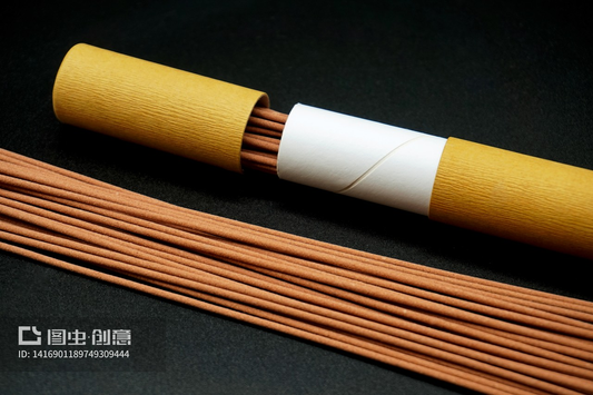 A bundle of handcrafted incense sticks partially revealed from Monian’s minimalist tube — a quiet harmony of nature, ritual, and refined design.