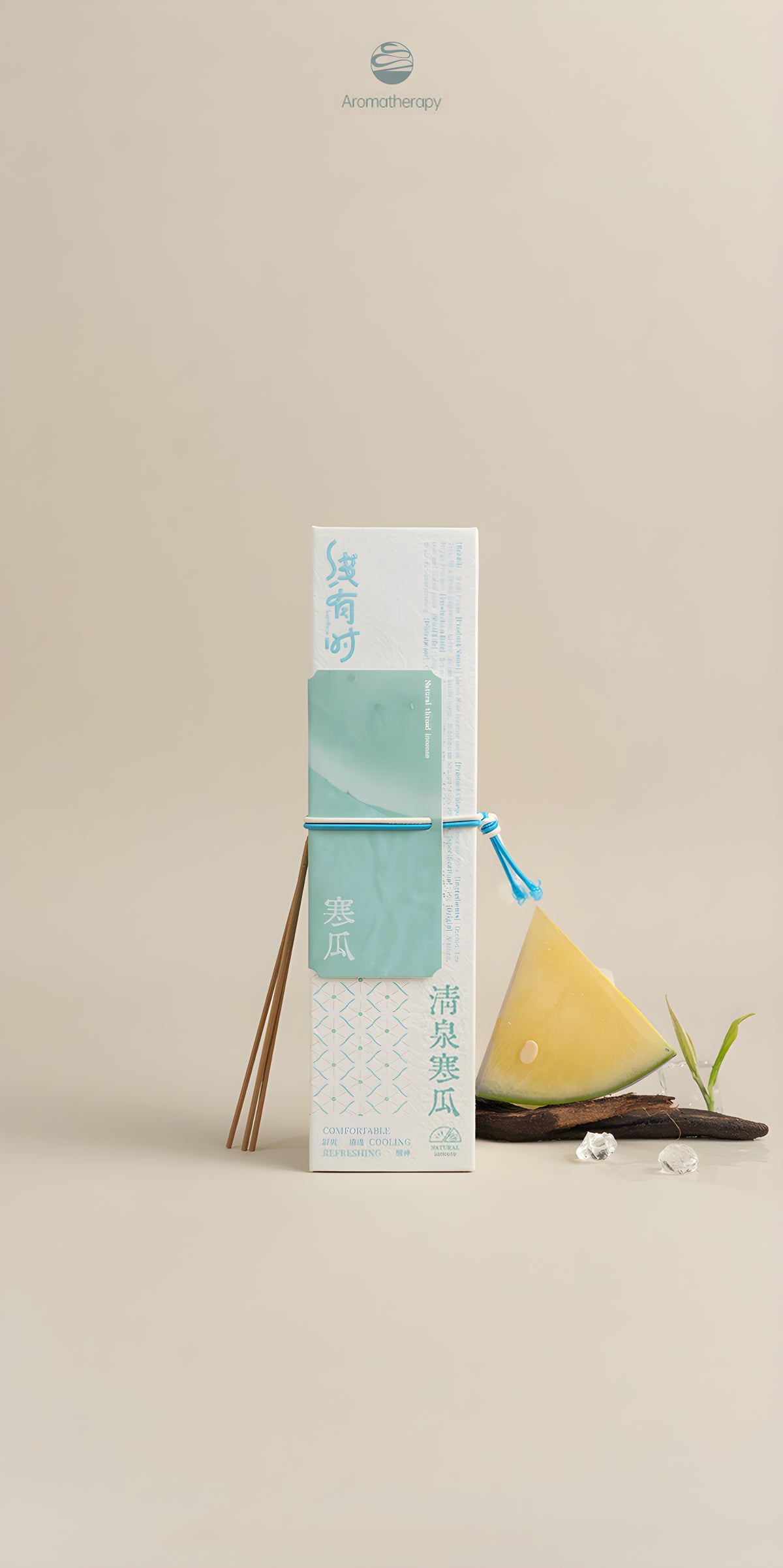 Melon note incense box with incense sticks and a melon slice on a beige background.