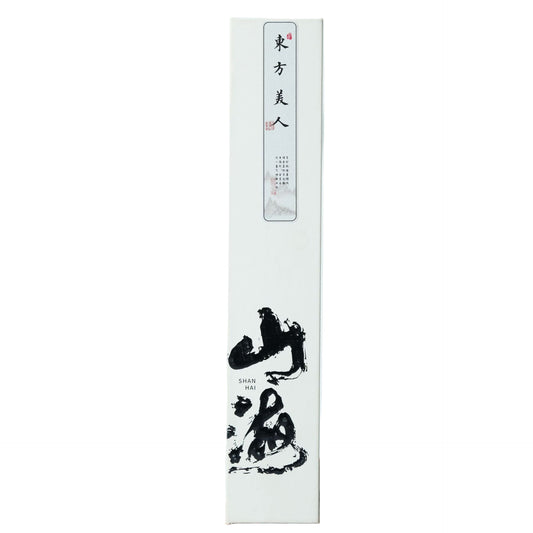 White product packaging with black text and design on a light gray background