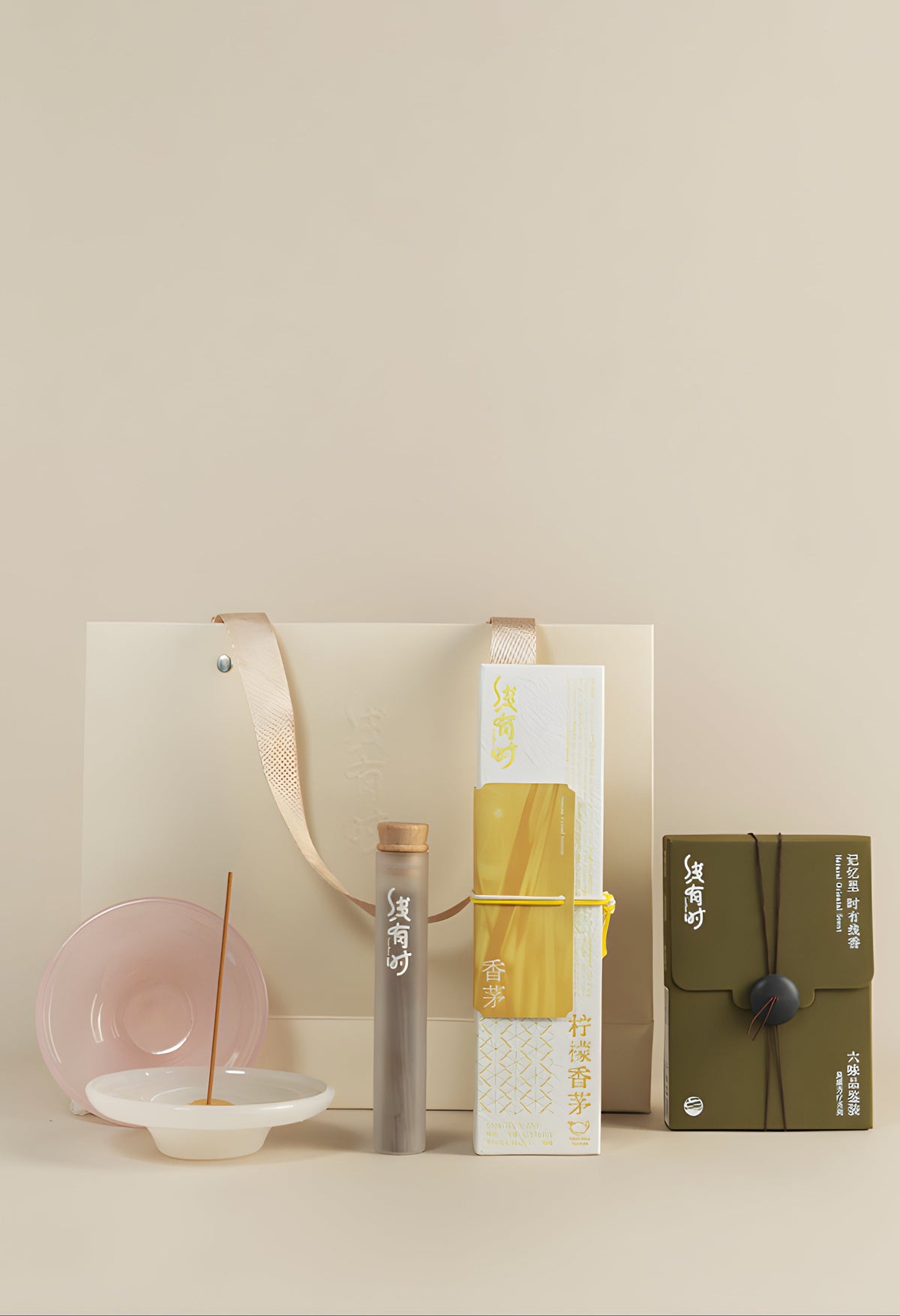Incense Beginner Set with a yellow lemongrass incense box, six-scent sampler, burner and cream gift bag.