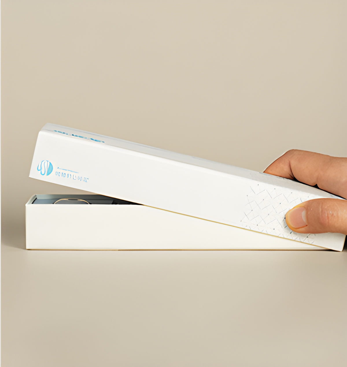 Hands lifting the lid of the white-and-teal melon note incense presentation box.
