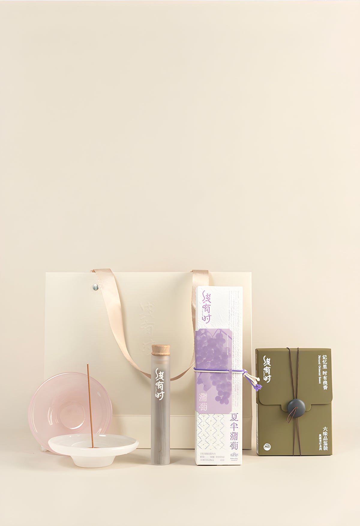 Incense Beginner Set with a purple grape incense box, six-scent sampler, burner and cream gift bag.