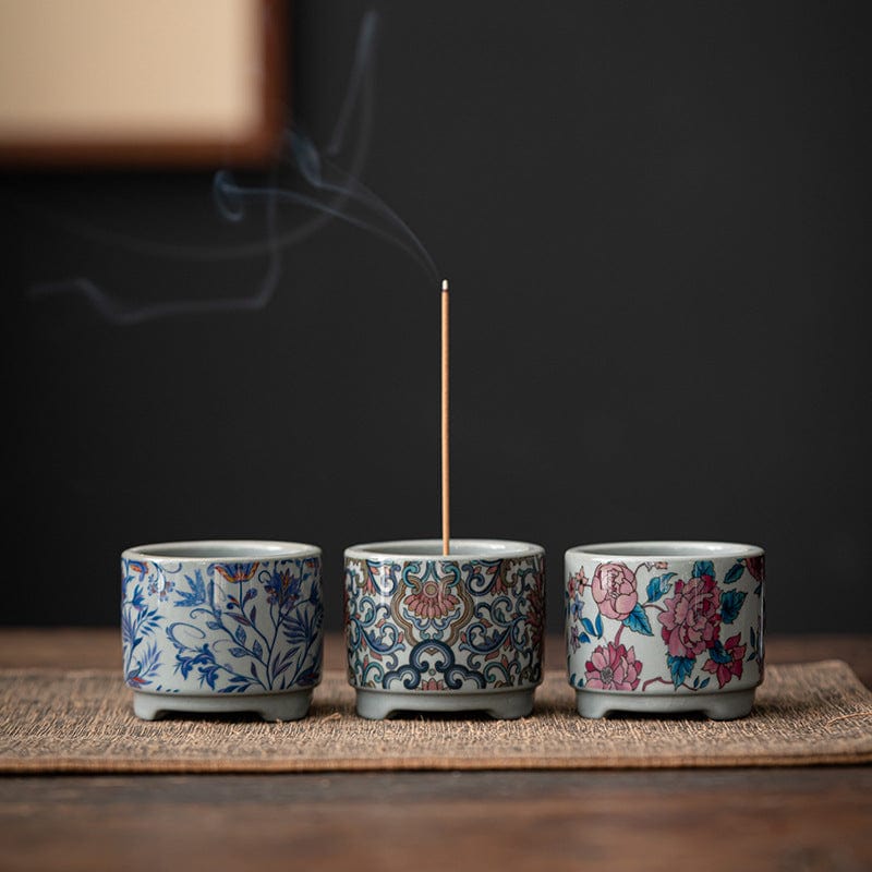 Hand-painted ceramic incense cup with traditional motifs of cranes, dragons, and florals, crafted for ritual and meditation use.