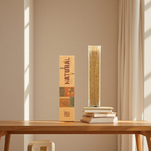 Pasta package and noodles on books on a wooden table with a neutral background