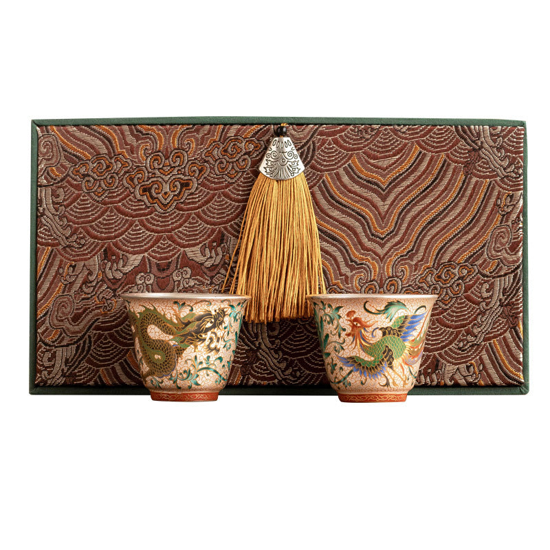 Dragon & Phoenix cloisonné silver-lined Chinese teacup pair for gongfu tea, couples, host & guest rituals and quietly auspicious daily tea moments.