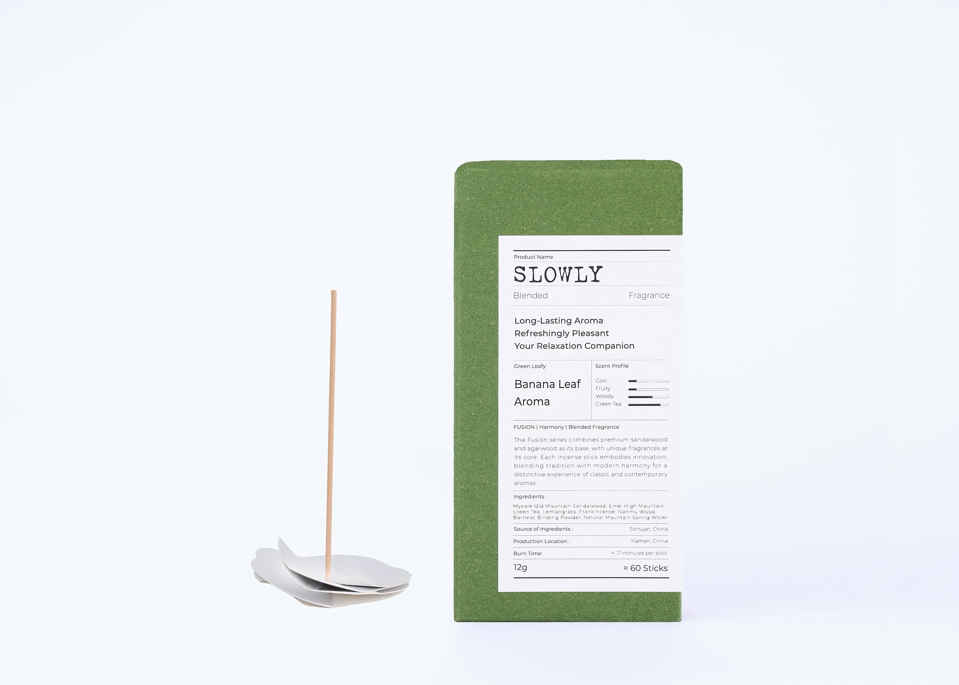 Incense stick with packaging labeled 'SLOWLY' on a white background