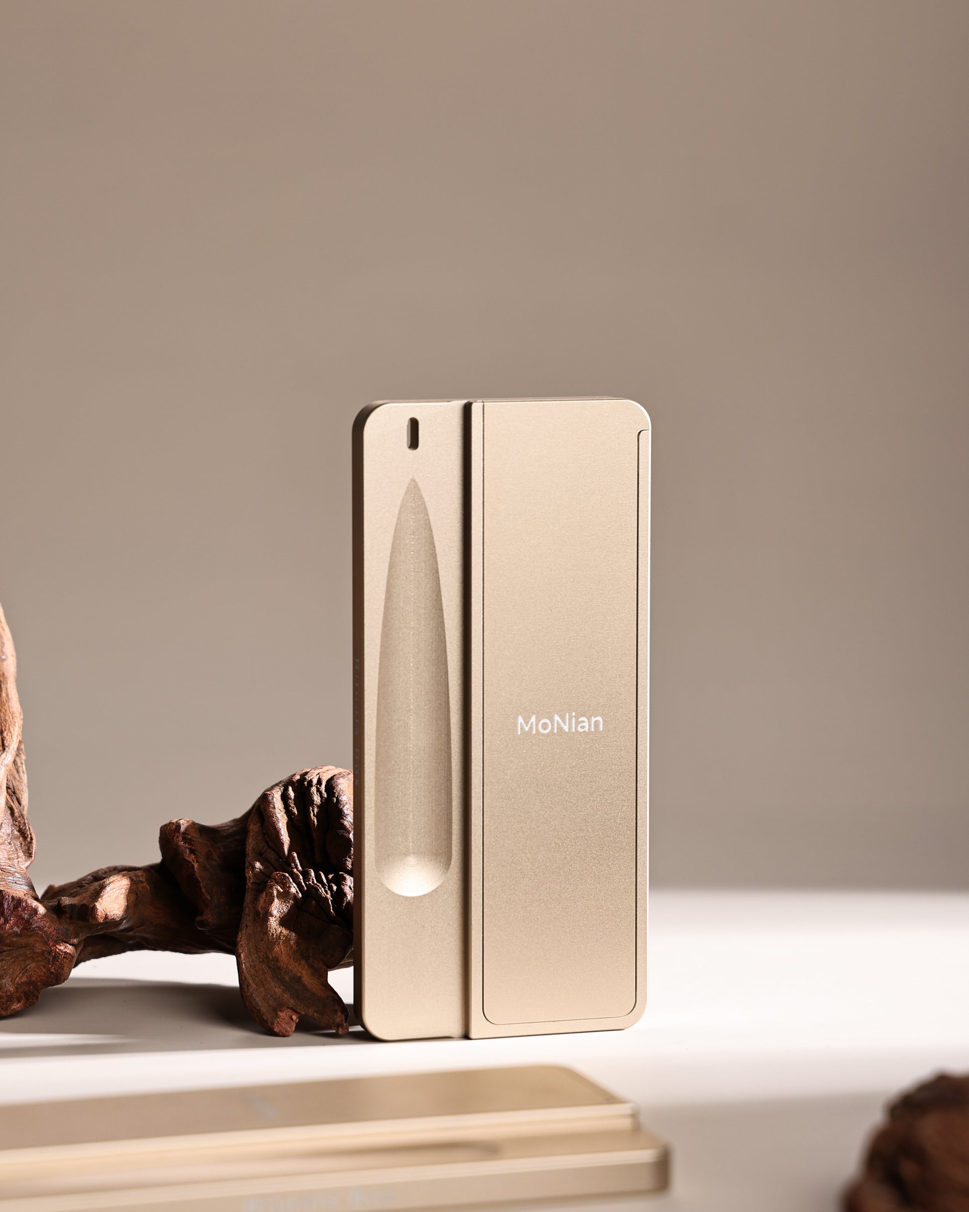 Monian Rituals Box open on driftwood showing integrated ash tray and incense groove design